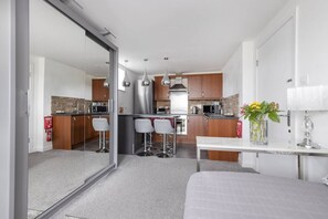 Comfort Apartment, City View | Private kitchen | Coffee/tea maker, electric kettle
