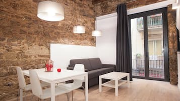 Loft | Área de sala de estar | Televisión de pantalla plana