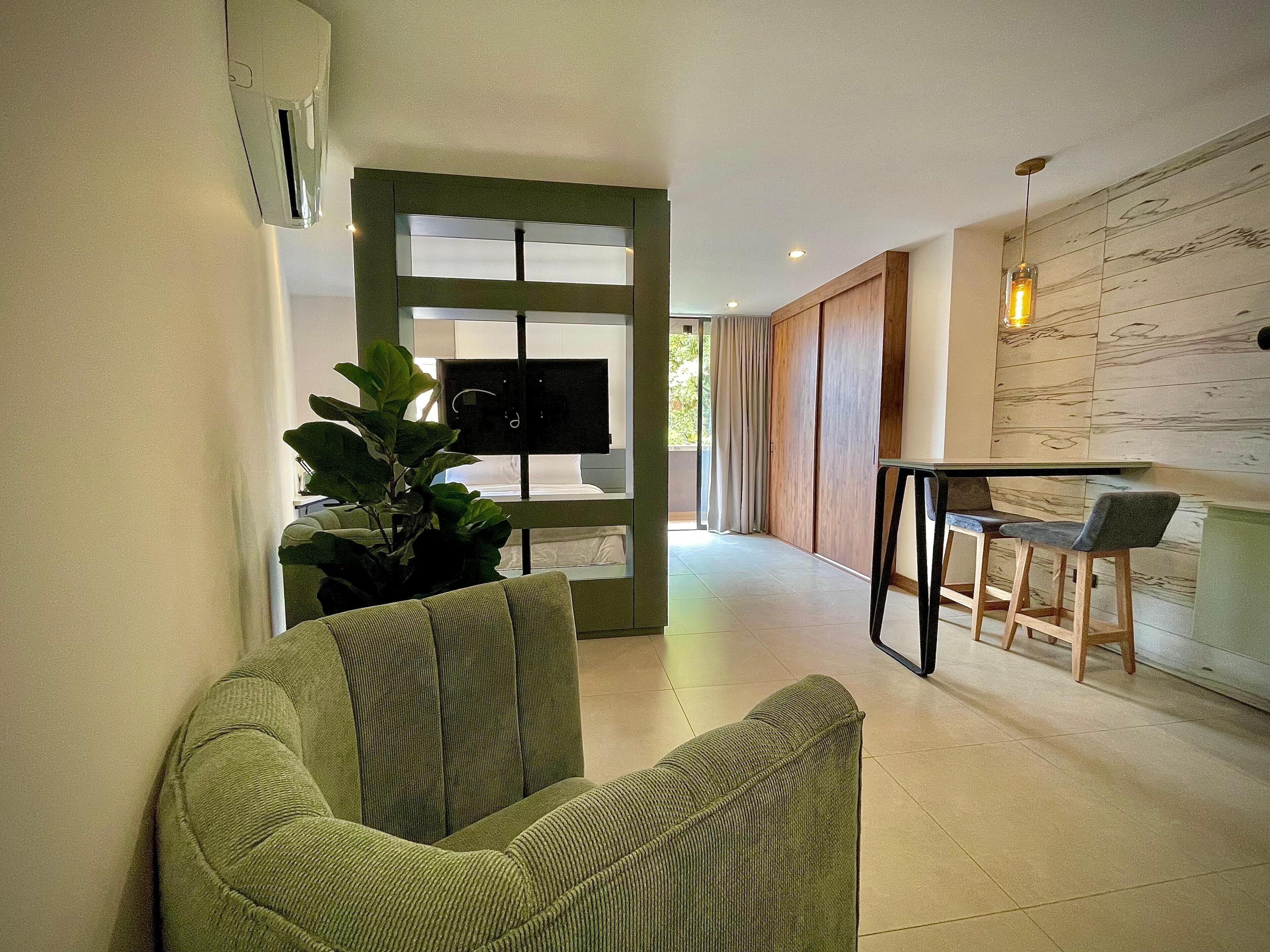 Comfort Double Room | Living area | 42-inch flat-screen TV with cable channels