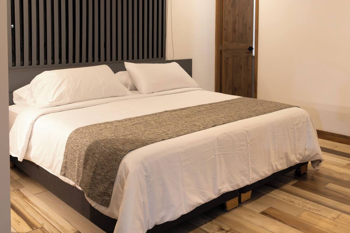 Design Room | 1 bedroom, down comforters, in-room safe, individually decorated