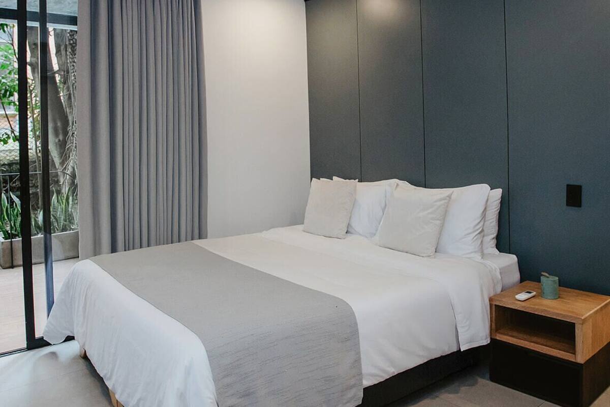 Premier Double Room | 1 bedroom, down comforters, in-room safe, individually decorated