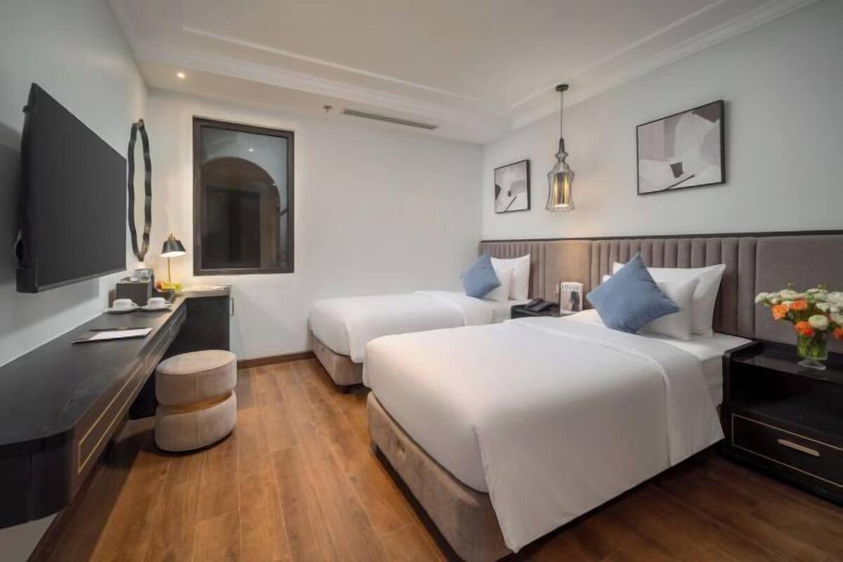 Luxe beddengoed, een minibar, een kluis op de kamer, een bureau