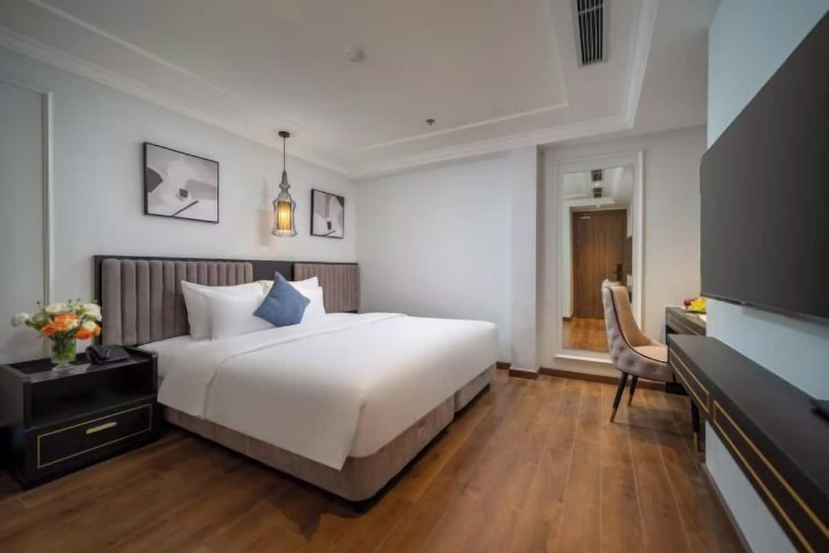 Luxe beddengoed, een minibar, een kluis op de kamer, een bureau