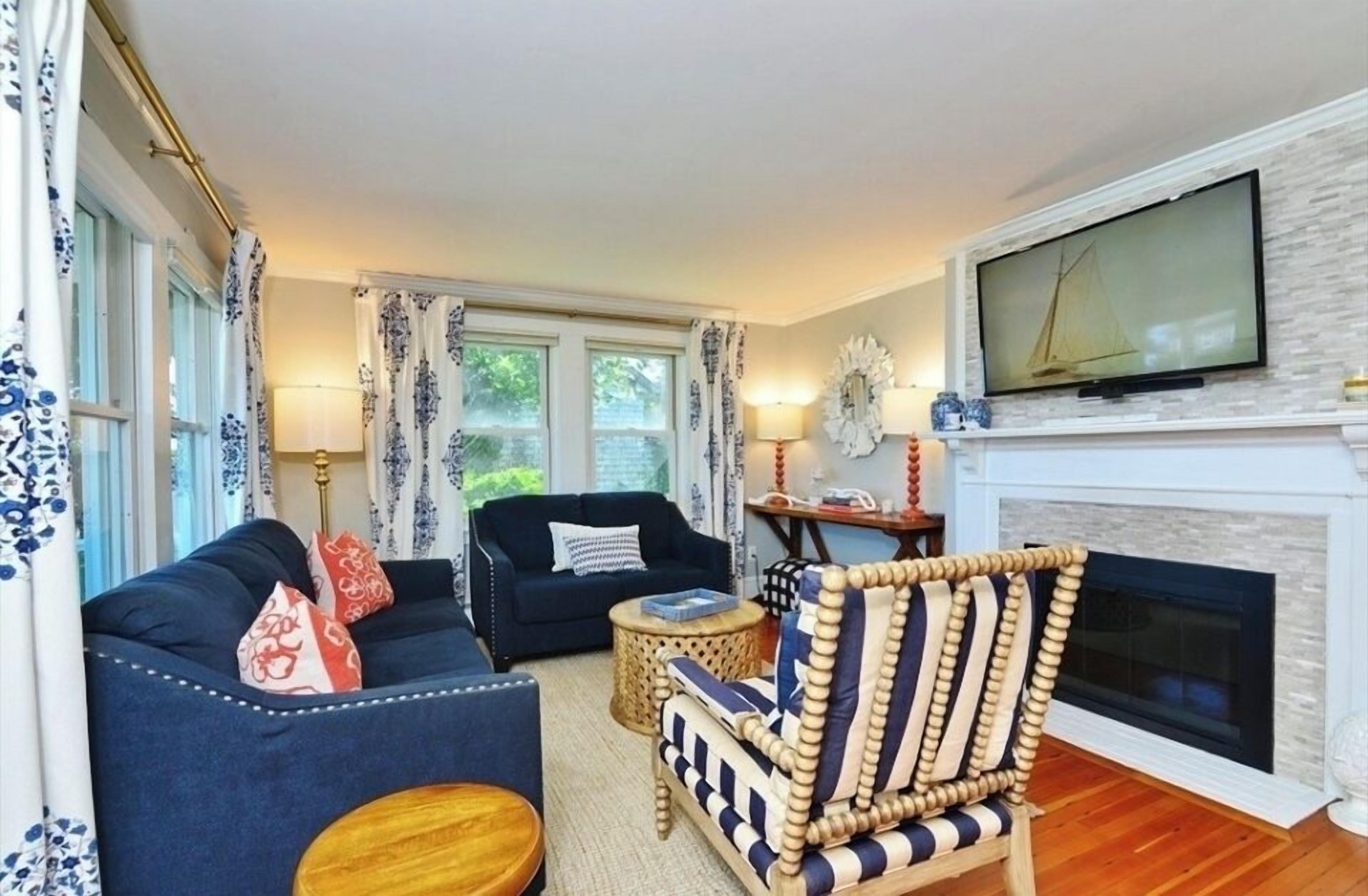 Smart TV, fireplace, books