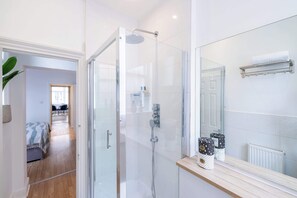Eco-friendly toiletries, hair dryer, towels