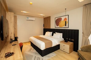 In-room safe, desk, laptop workspace, blackout curtains