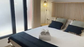 2 slaapkamers, een strijkplank/strijkijzer, gratis wifi, beddengoed