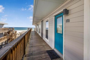 Enjoy stunning ocean views from the deck of this beachfront hotel room.