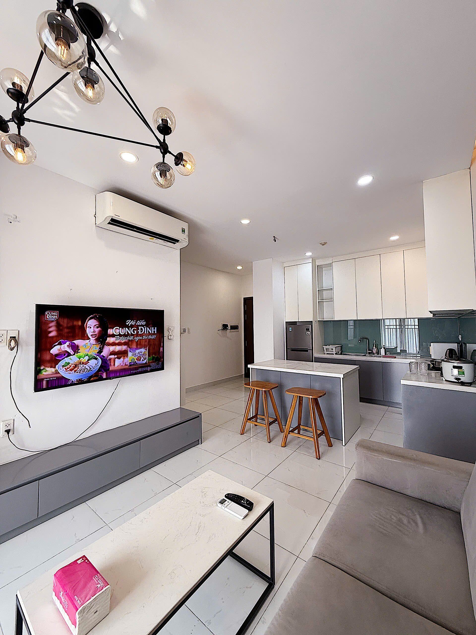 Comfort Apartment, City View | Living area | 55-inch LED TV with cable channels