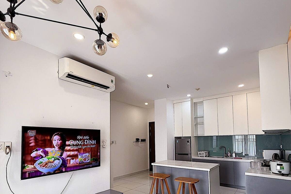 Comfort Apartment, City View | Living area | 55-inch LED TV with cable channels