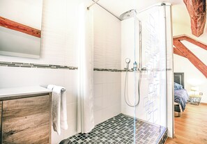 Shower, hair dryer, towels, soap