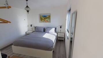 1 habitación, tabla de planchar con plancha, wifi y ropa de cama