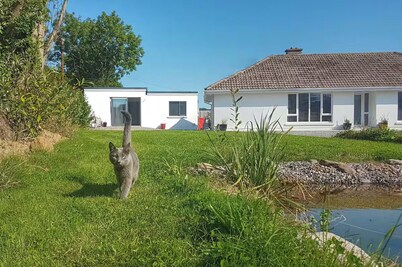 Attractive light-filled detached apartment near the sea in an East Cork village.