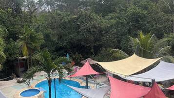 Outdoor pool, open 8:00 AM to 9:00 PM, pool umbrellas, pool loungers