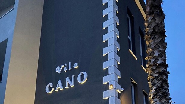 A building with a sign reading "Vila CANO". - VILA CANO (Durrës)
