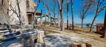 Magical Castle Retreat with lake access, private boat launch, sleeps up to 18!
