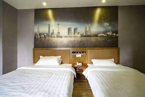 A hotel room with two beds, a cityscape painting on the wall, and a wooden headboard. - Hammerhams Hotel Shanghai (Songjiang University Town) (Shanghai)