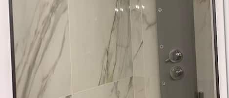 Shower, hair dryer, bidet, towels