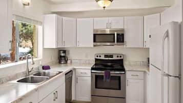 Fridge, microwave, coffee/tea maker, highchair