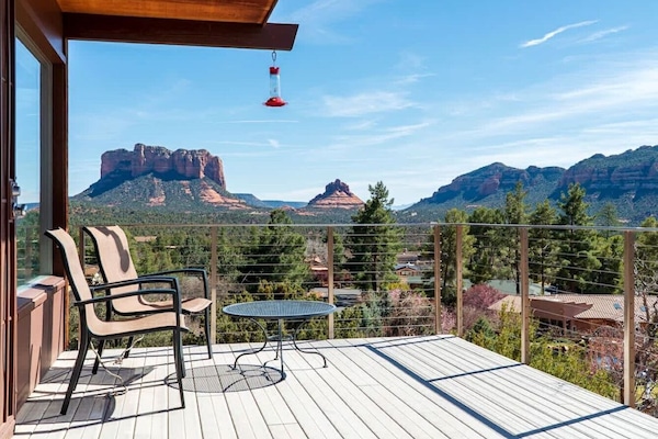 Side porch overlooking the scenery and mansion.