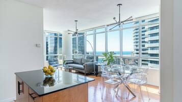 Deluxe Condo, Balcony | Living area