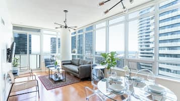 Deluxe Condo, Balcony | Living area