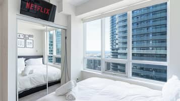 Deluxe Condo, Balcony | 2 bedrooms, WiFi (free), bed sheets