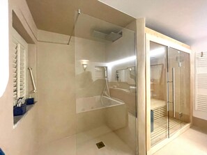 Shower, jetted bath, hair dryer, bidet