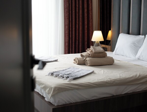 4 bedrooms, in-room safe, iron/ironing board, travel cot