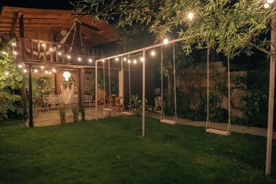 Casa Centralita: central San Cris, with views, yard, fire pit + tree house!