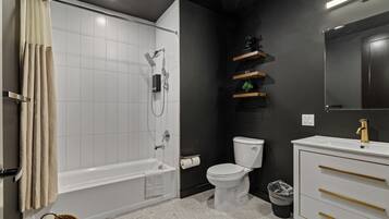 Hair dryer, towels, soap, shampoo