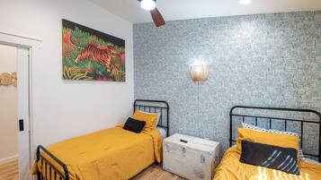 4 bedrooms, desk, iron/ironing board, travel crib