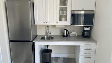 Fridge, microwave, coffee/tea maker, toaster
