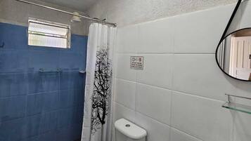 Shower, towels, soap, toilet paper