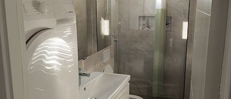 Hair dryer, towels, soap, toilet paper