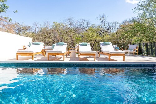 New Listing!!.....Elegant 5BR Villa with Pool and walk to the beach.