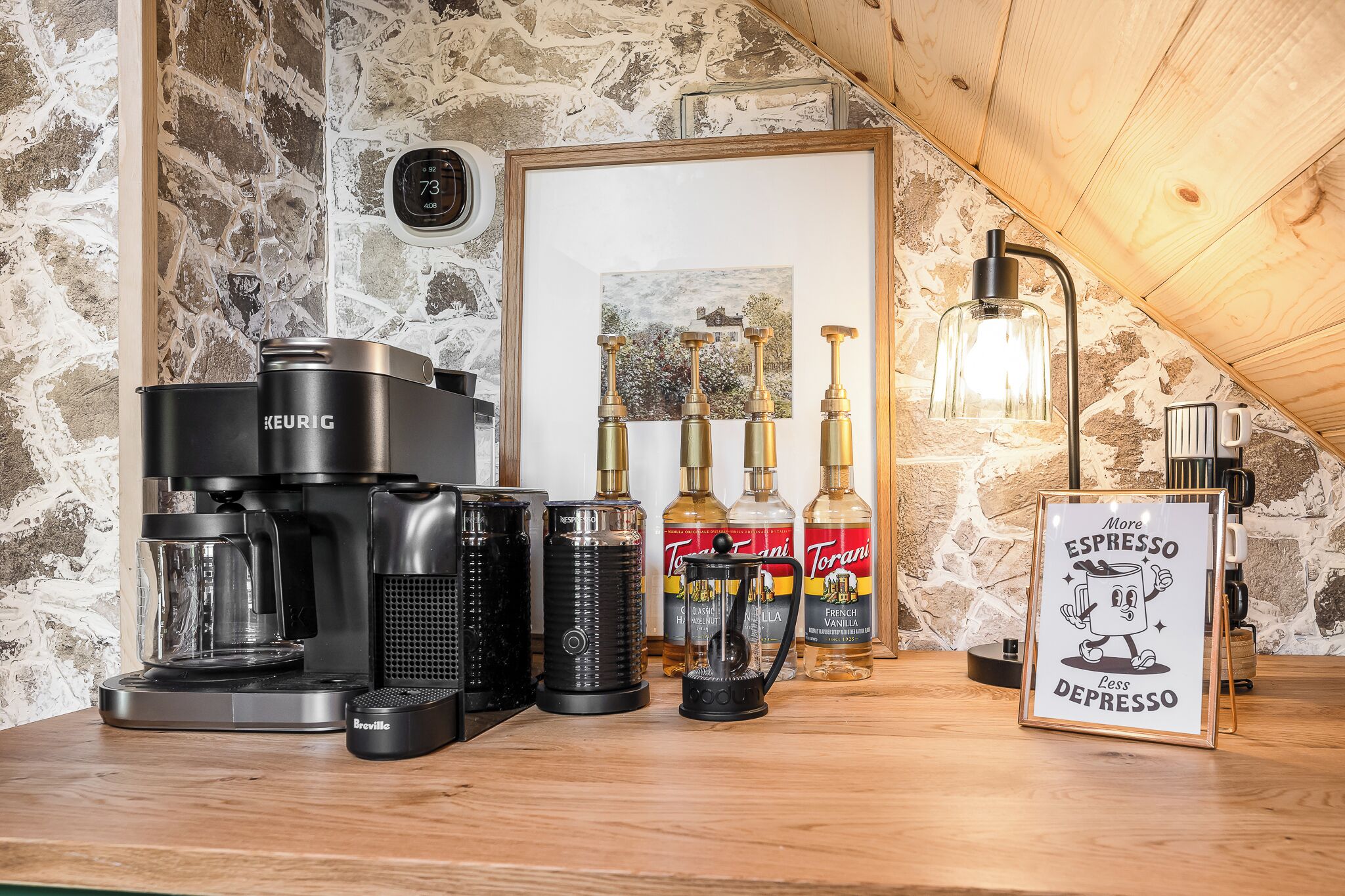 A coffee station with various brewing equipment, espresso machines, and coffee beans.