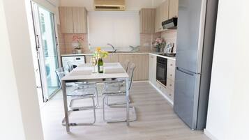 Fridge, oven, electric kettle, high chair