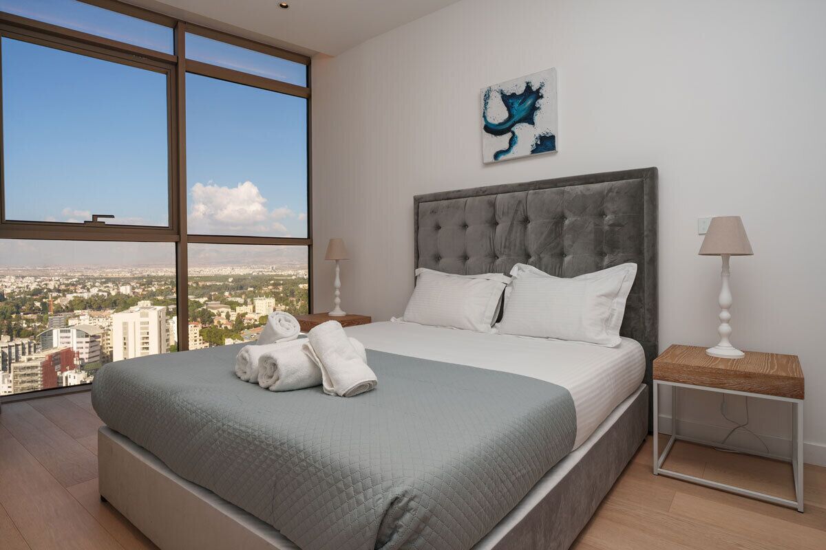 2 dormitorios, tabla de planchar con plancha, cuna de viaje y wifi