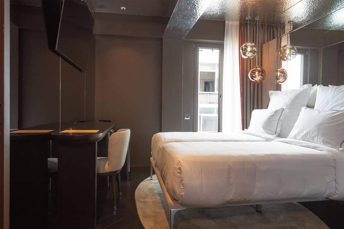 Chambre, 2 lits une place, balcon | Minibar, coffres-forts dans les chambres, bureau, Wi-Fi gratuit