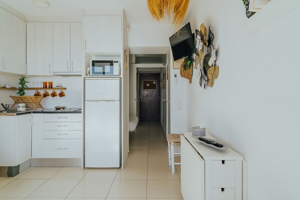 Fridge, microwave, coffee/tea maker, electric kettle