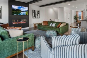 TV, fireplace - Sophisticated Escape with Scenic Rooftop – Minutes to Downtown Hotspots (Raleigh)