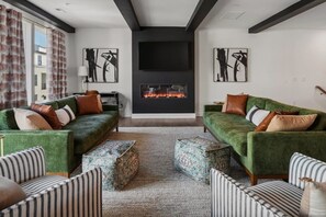 TV, fireplace - Sophisticated Escape with Scenic Rooftop – Minutes to Downtown Hotspots (Raleigh)
