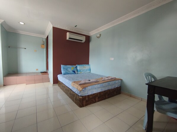 Habitación Deluxe | Escritorio, wifi gratis y ropa de cama 