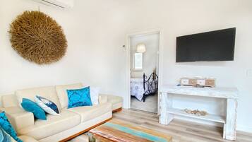 3 habitaciones, tabla de planchar con plancha y cuna de viaje