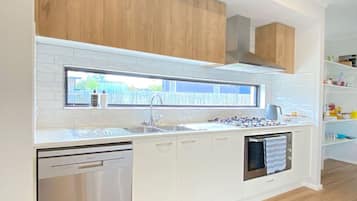 Fridge, coffee/tea maker, cookware/dishes/utensils