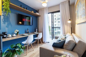Apartamento | Área de estar | Smart TV 43 polegadas com canais digitais