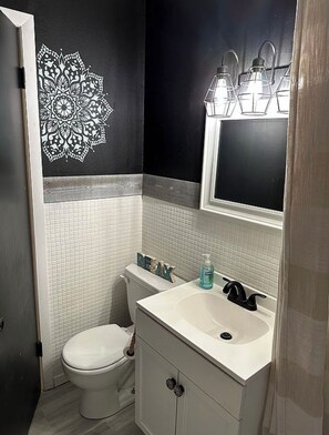 Hair dryer, towels, soap, toilet paper