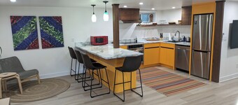 The Apartment.  Cozy one bedroom modern place.  Close to downtown and breweries