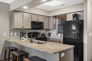 Fridge, microwave, oven, stovetop - 2 BDRM Lake Community Condo sleeps 10, Ticket Deals, Resort Amenities, 2 min to SDC! (Branson)